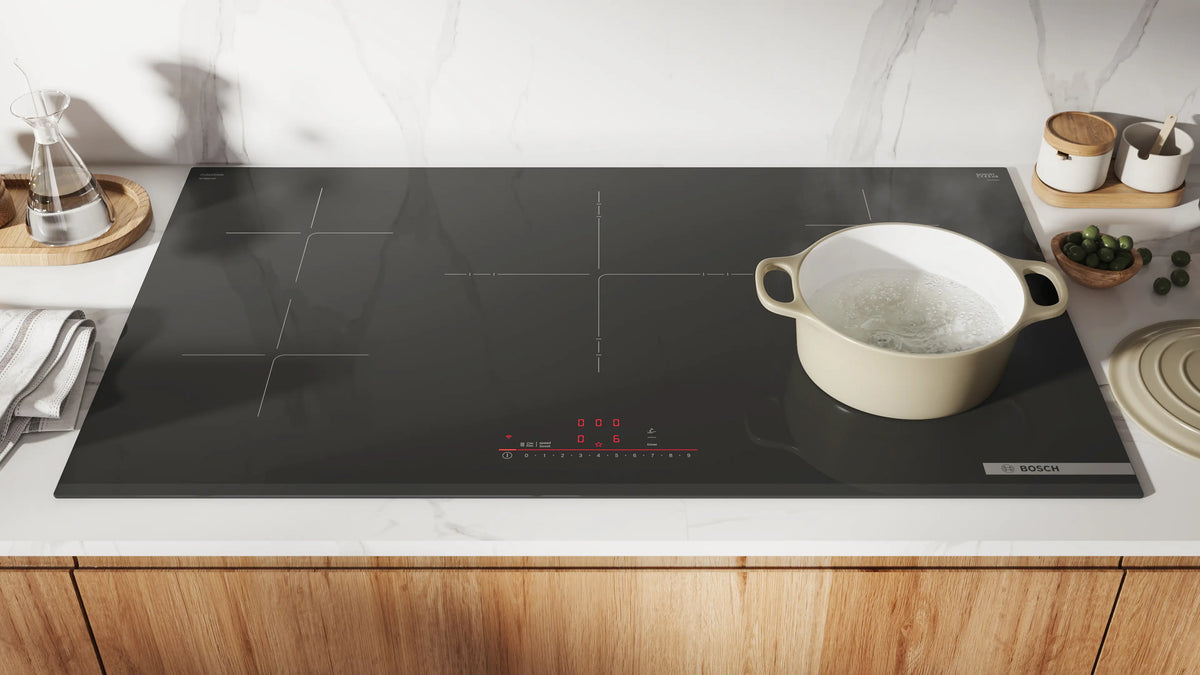 Bosch NIT8661UC induction cooktop lifestyle image 1