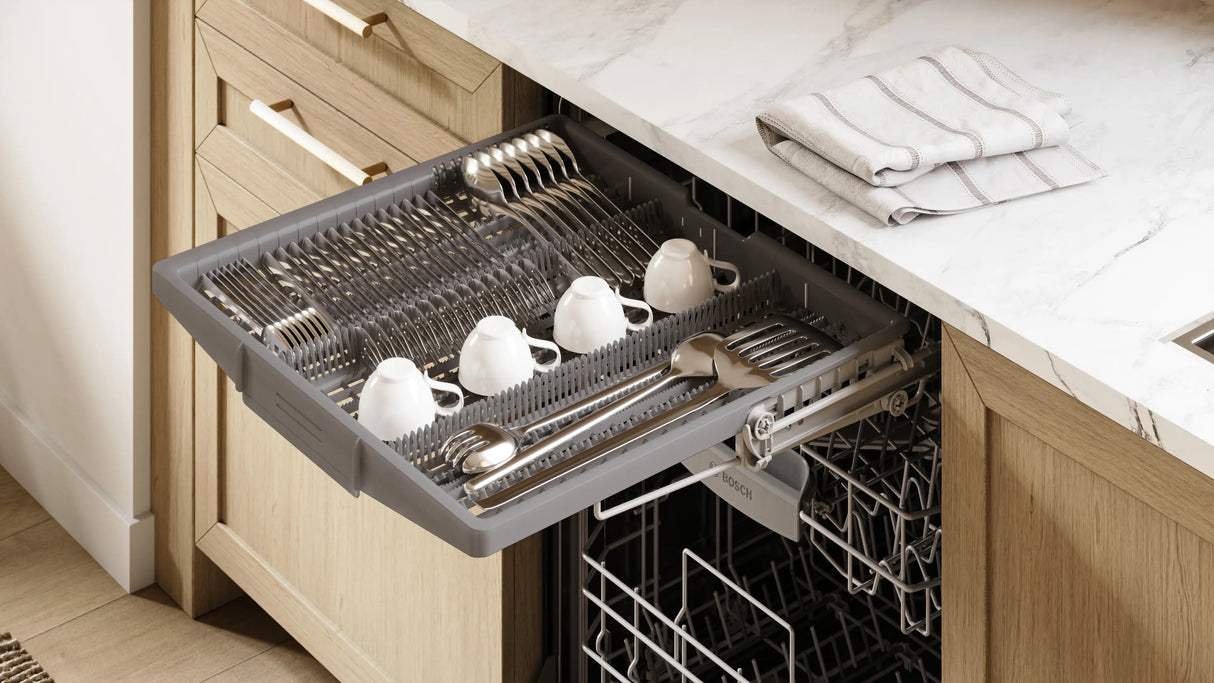 Bosch SHX53DM5N dishwasher installed in kitchen