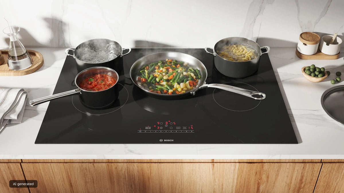 Bosch NET8062UC electric cooktop in use with cookware