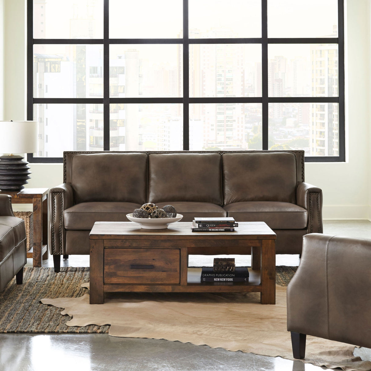 Gunderson - Upholstered Recessed Sofa In Sugar Leather With Tapered Legs - Brown