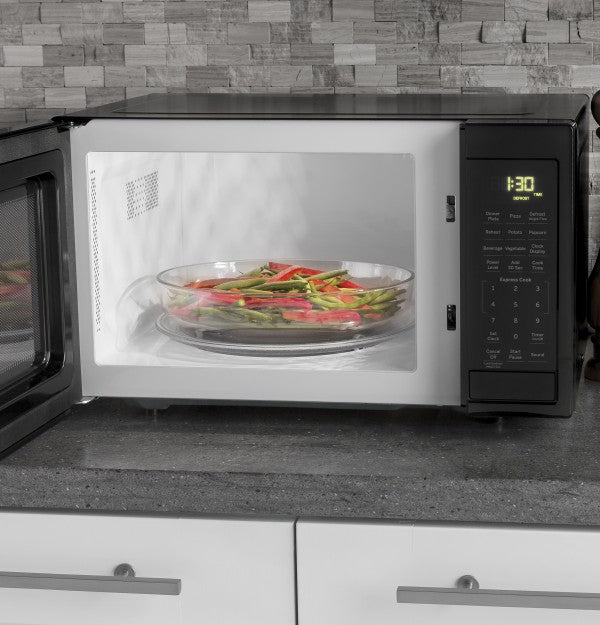 GE 0.7 Cu. Ft. Countertop Microwave Oven, Black - GCST07N1WBB