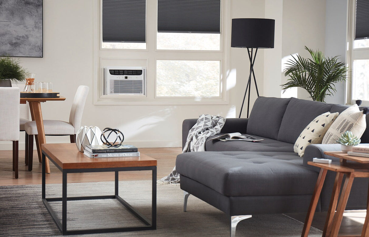 Frigidaire FHWW123WB1 12,000 BTU WiFi Connected Window-Mounted Room Air Conditioner installed in a living room window