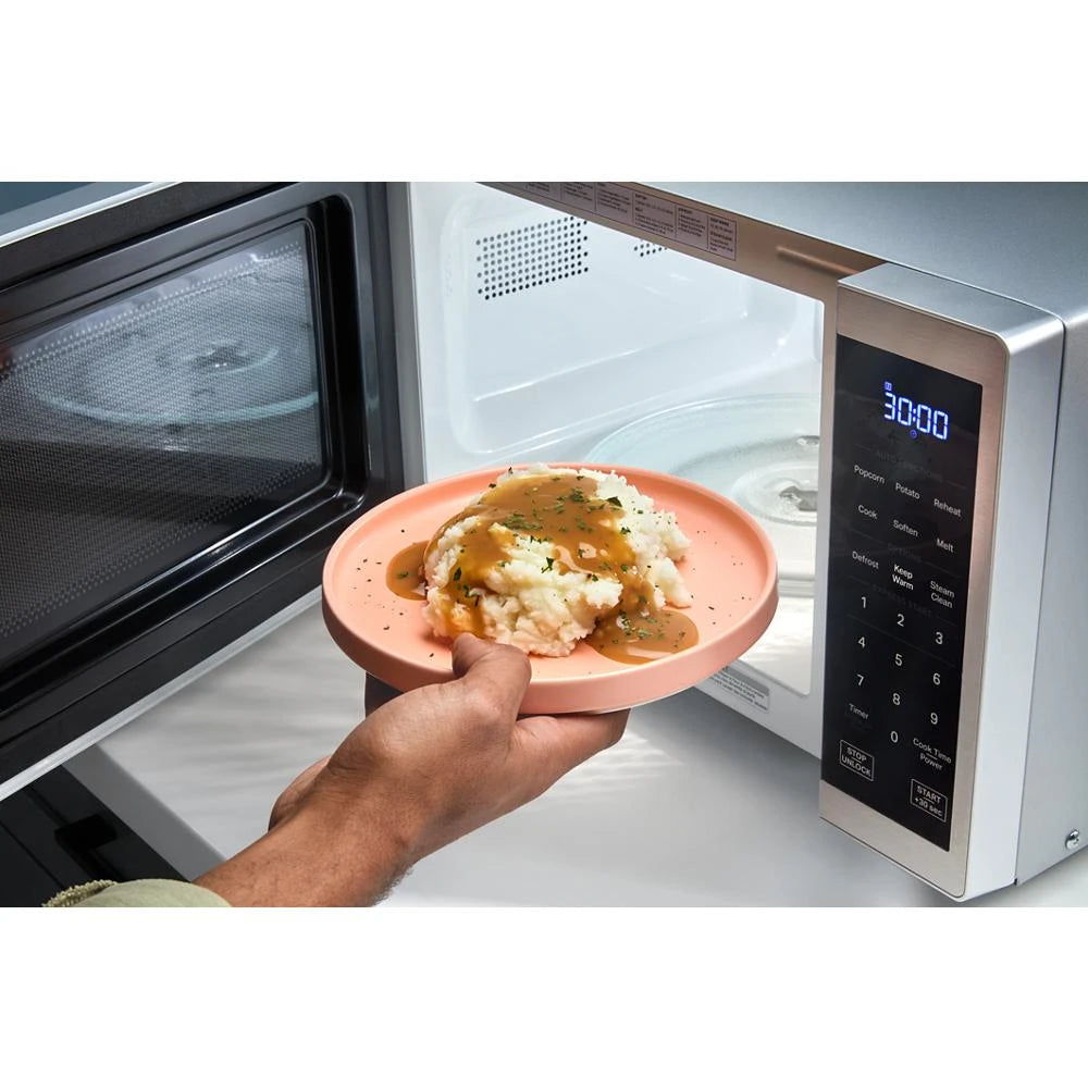 0.7 cu. ft. White Countertop Microwave With Steam Clean - 700 watt - (WMCS3018RW)