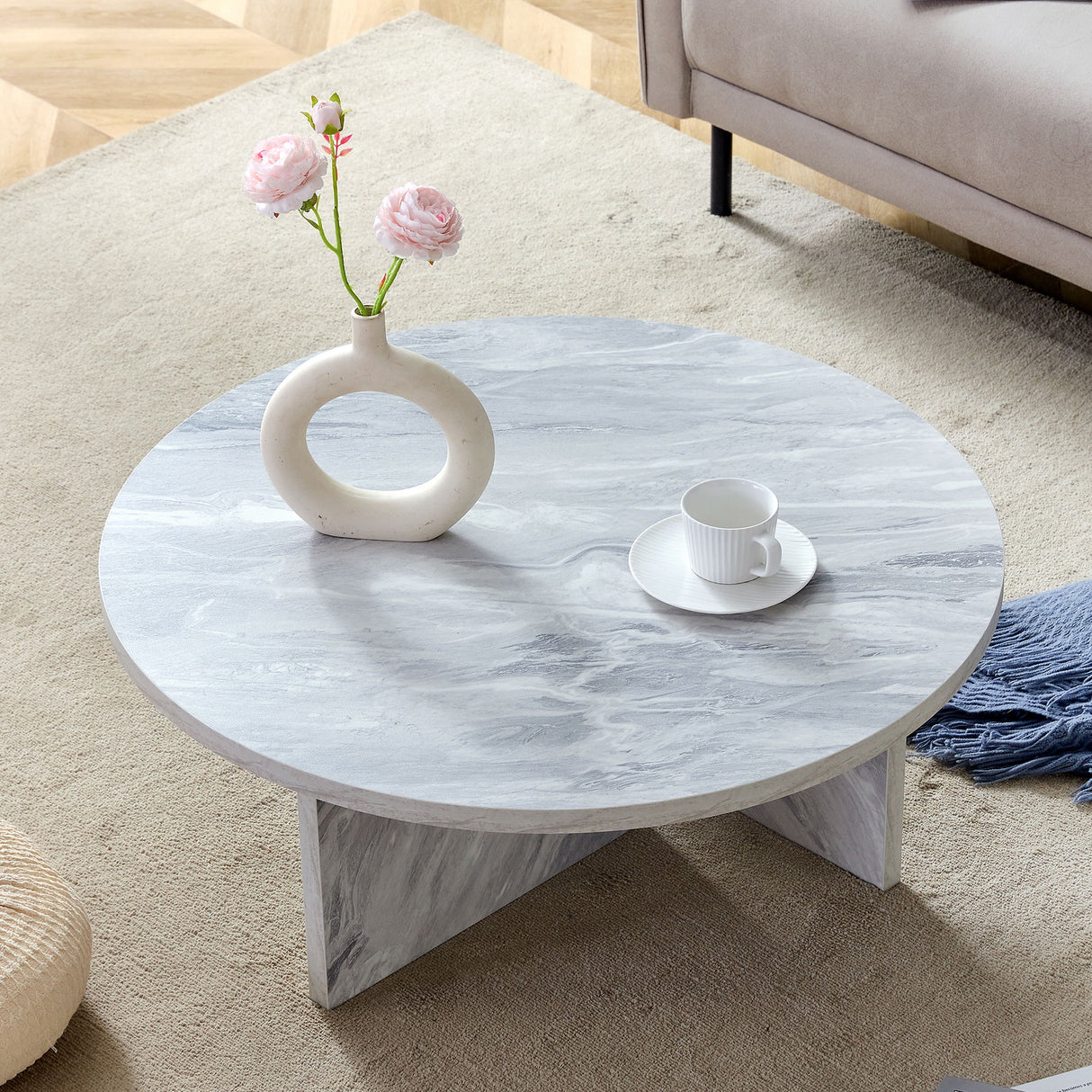 Versatile Round Coffee Table For Various Interior Styles