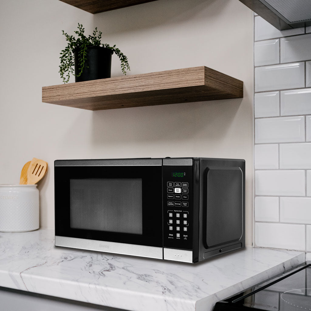 Danby DBMW0925BBS microwave on a countertop