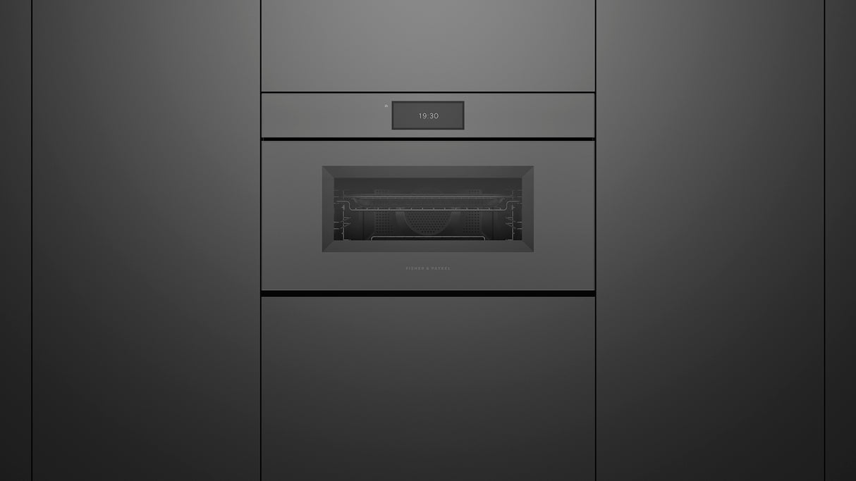 Fisher & Paykel OM30NMUNG3 Minimal Handleless Compact Convection-Speed Oven installed in modern kitchen