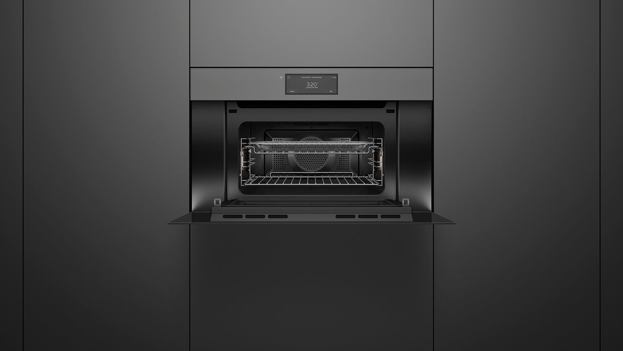 Fisher & Paykel OM30NMUNG3 Minimal Handleless Compact Convection-Speed Oven installed, angled kitchen view