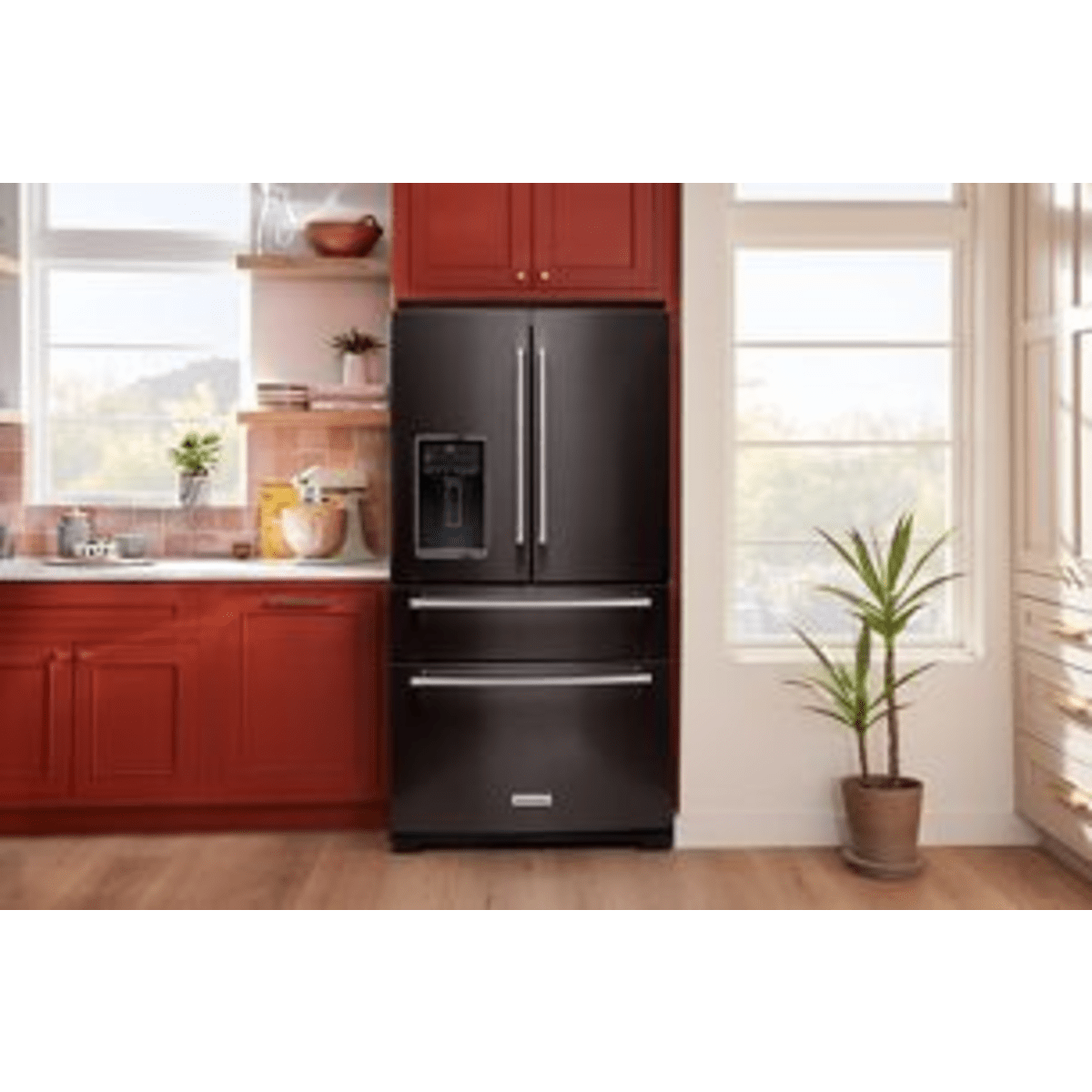 KitchenAid KRMF536RBS 36 in. Freestanding French Door Refrigerator, Black Stainless - shown in a kitchen setting | Varouj Appliances