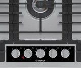 Bosch NGMP659UC knobs and bezel close up