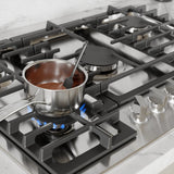 Bosch NGM5659UC gas cooktop melting chocolate on OptiSim burner