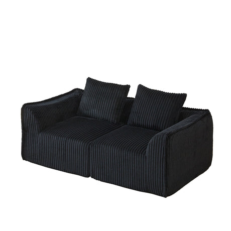 Minimalist Sofa With Curved Lines And Horn Shaped Throw Pillows
