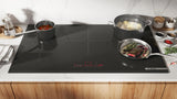 Bosch NIT8661UC induction cooktop lifestyle image 3