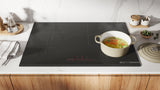 Bosch NIT8061UC induction cooktop lifestyle kitchen view