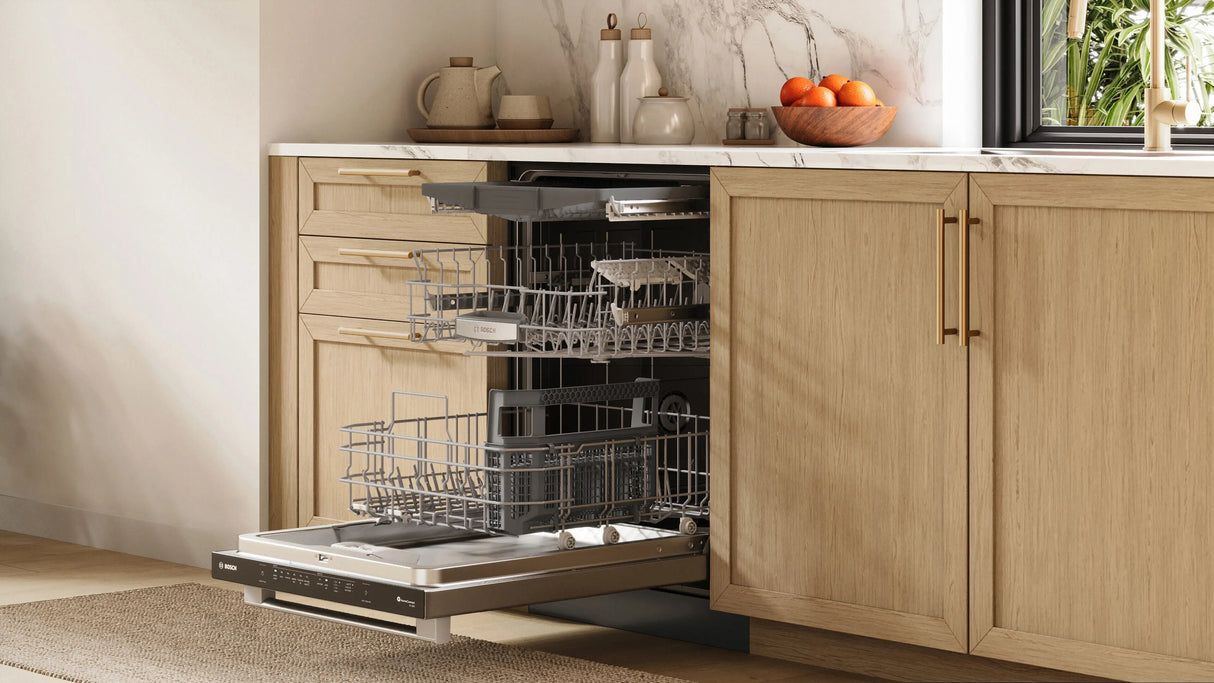Bosch SHX65DM5N dishwasher installed in kitchen