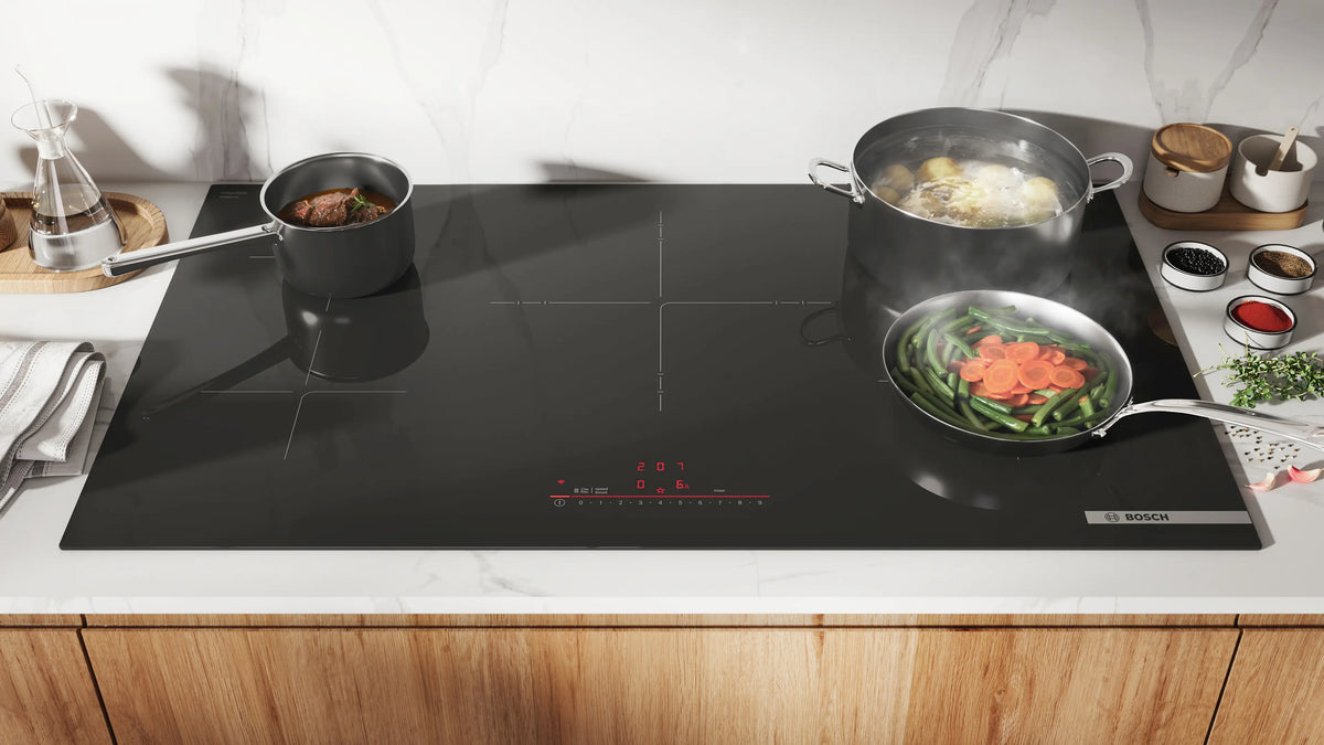 Bosch NIT5663UC induction cooktop cooking lifestyle