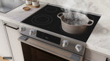 Bosch HEF3050MU ceramic glass cooktop cooking zone close up