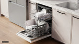 Bosch SHP53EM2N dishwasher angled with door open