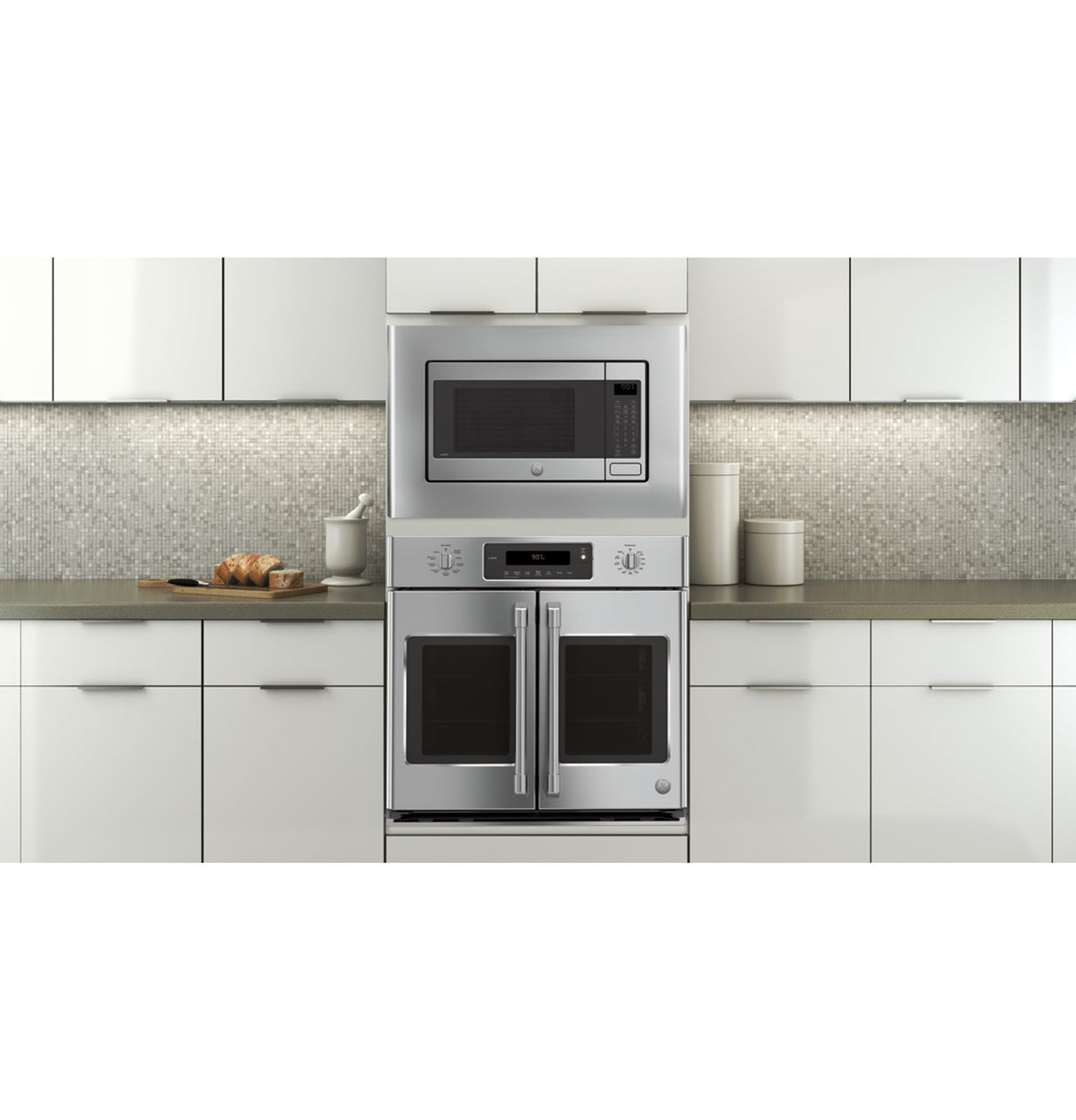 GE JX9152SJSS 27 inch built-in microwave trim kit installed view