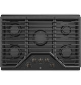 GE Profile PGP7030BMTS 30 inch built-in gas cooktop in black stainless steel top view