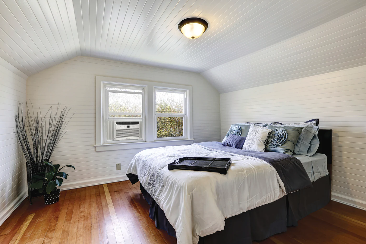 Frigidaire 5,000 BTU Window-Mounted Room Air Conditioner installed in a bedroom window