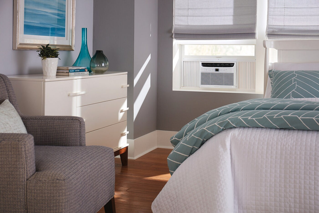 Frigidaire 5,000 BTU Window-Mounted Room Air Conditioner installed in a bedroom window