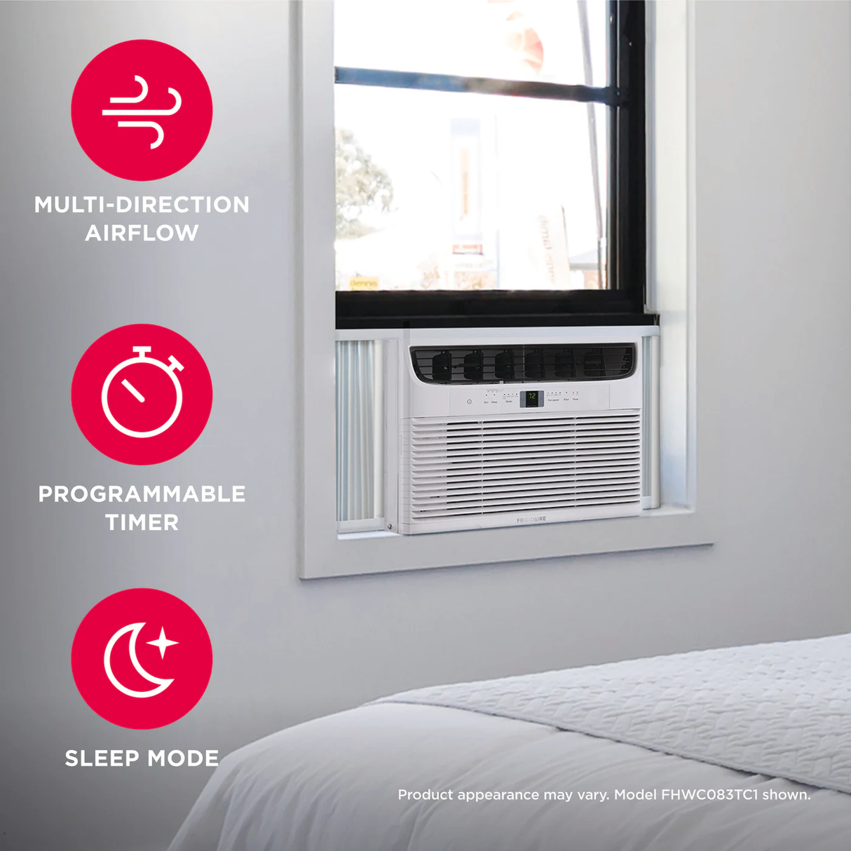 Frigidaire 12000 BTU window air conditioner installed on a bedroom window with product features