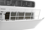 Close-up view of a Frigidaire 12,000 BTU Window Room Air Conditioner with Wi-Fi, model FHWV124TE1, with the front panel open to reveal a white, removable mesh air filter. The filter is designed for easy cleaning and maintenance of the AC unit