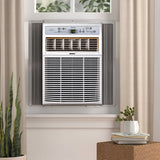 Midea 10,000 BTU  Casement Window Air Conditioner installed in a room window.