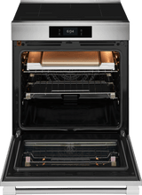 Frigidaire Professional PCFI3085BF oven with accessories