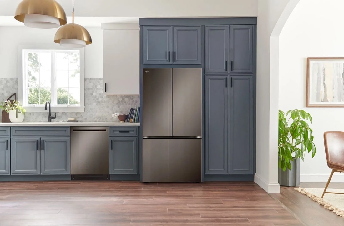 LG LRFLC2716D refrigerator installed in kitchen lifestyle view
