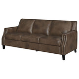 Gunderson - Upholstered Recessed Sofa In Sugar Leather With Tapered Legs - Brown