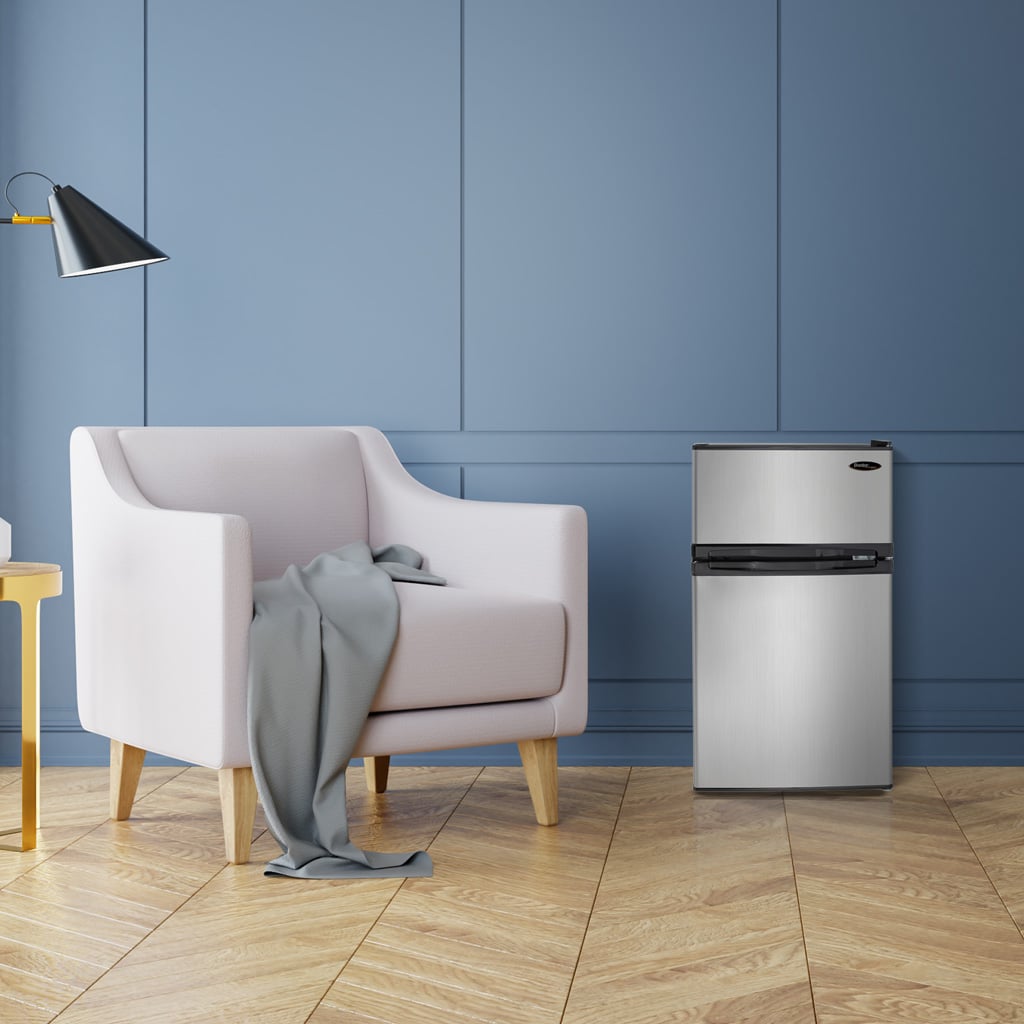 Danby DCR031B1BSLDD compact fridge in a room setting