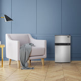 Danby DCR031B1BSLDD compact fridge in a room setting