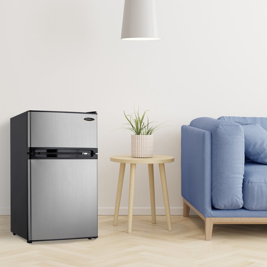 Danby DCR031B1BSLDD compact fridge in an office setting