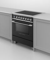 Fisher & Paykel OR30SCI6B1 range in kitchen, cooktop detail