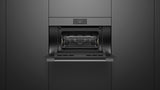Fisher & Paykel OM30NMUG3 Minimal Compact Convection-Speed Oven installed, angled kitchen view