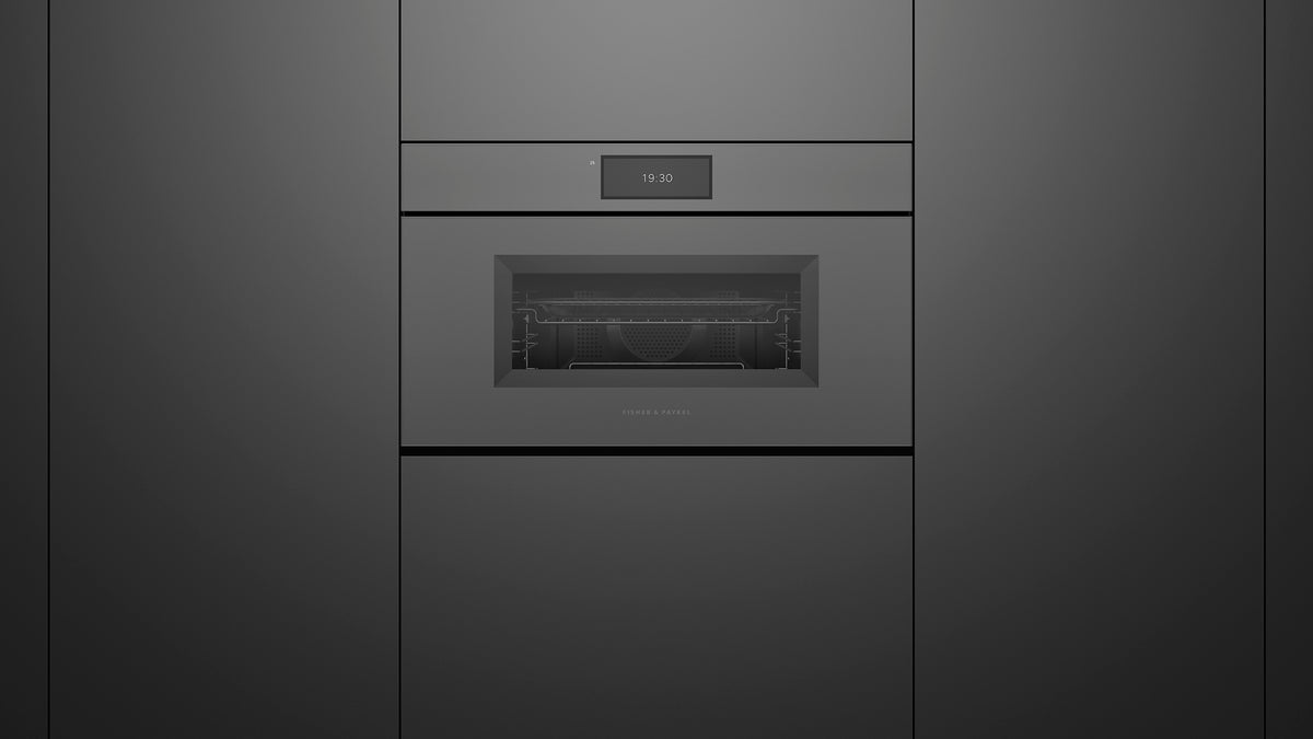 Fisher & Paykel OM30NMUNG3 Minimal Handleless Compact Convection-Speed Oven installed in modern kitchen