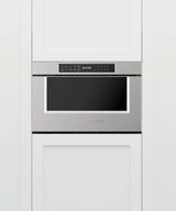 Fisher & Paykel 24 inch Series 7 Professional Microwave Drawer in stainless steel, angled view