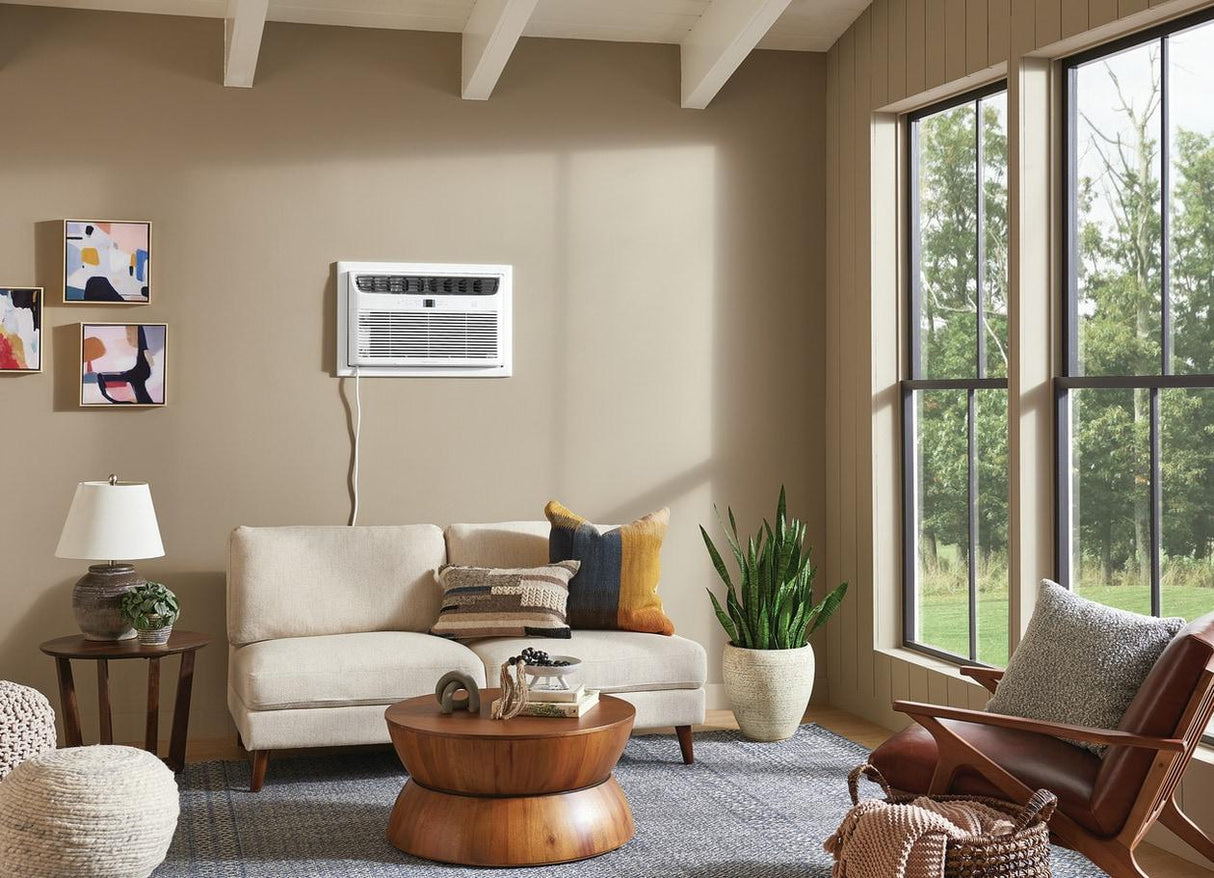 Frigidaire 12,000 BTU Built-In WiFi Room Air Conditioner  Model FHTW123WA1 installed in the living room wall