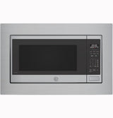 GE Profile PCWK22U1WSS microwave shown with matching built-in trim kit