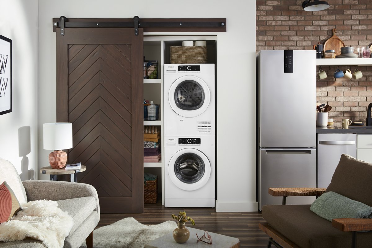 Whirlpool WCD3090JW dryer in laundry space