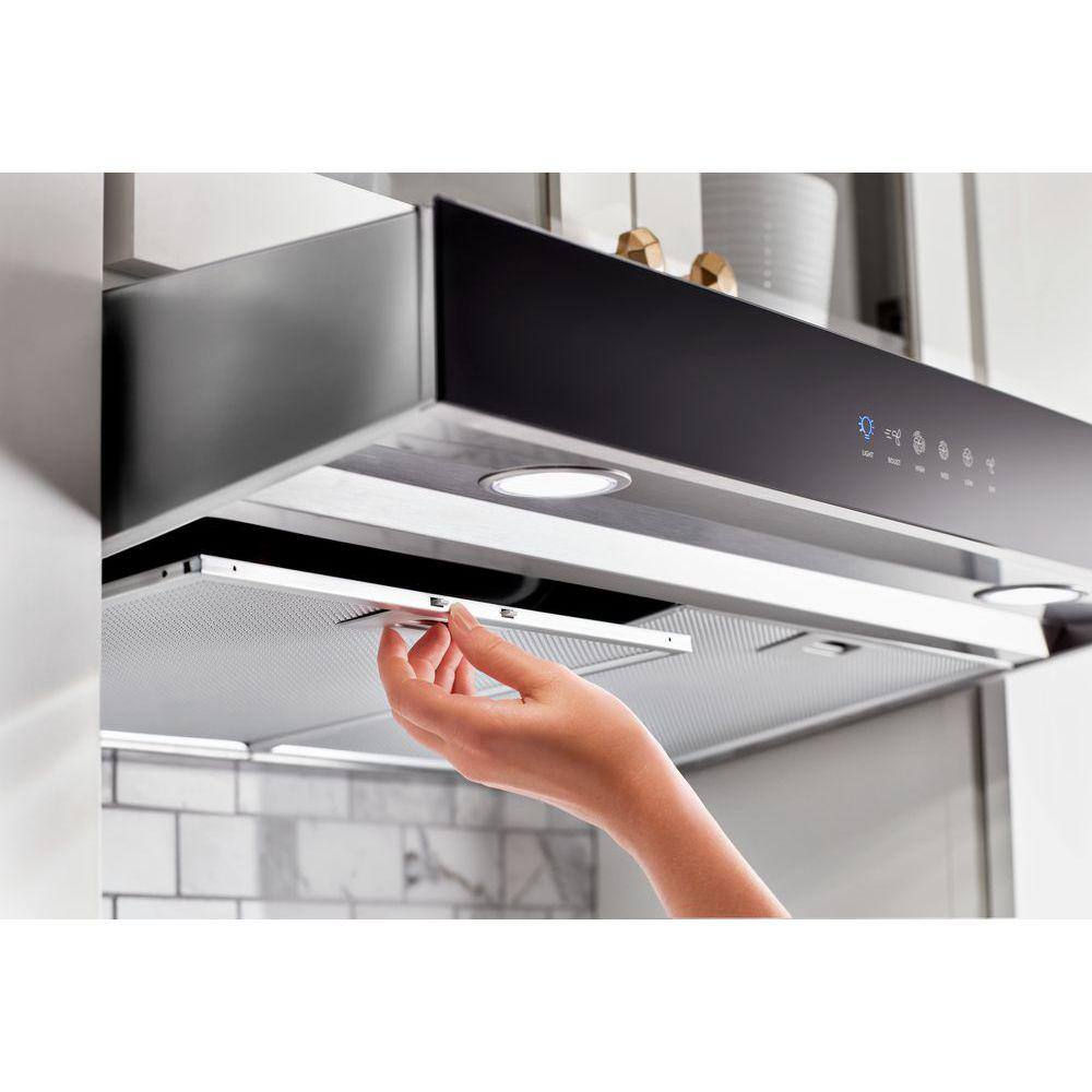 Whirlpool WVU57UC6FS stainless under-cabinet range hood controls