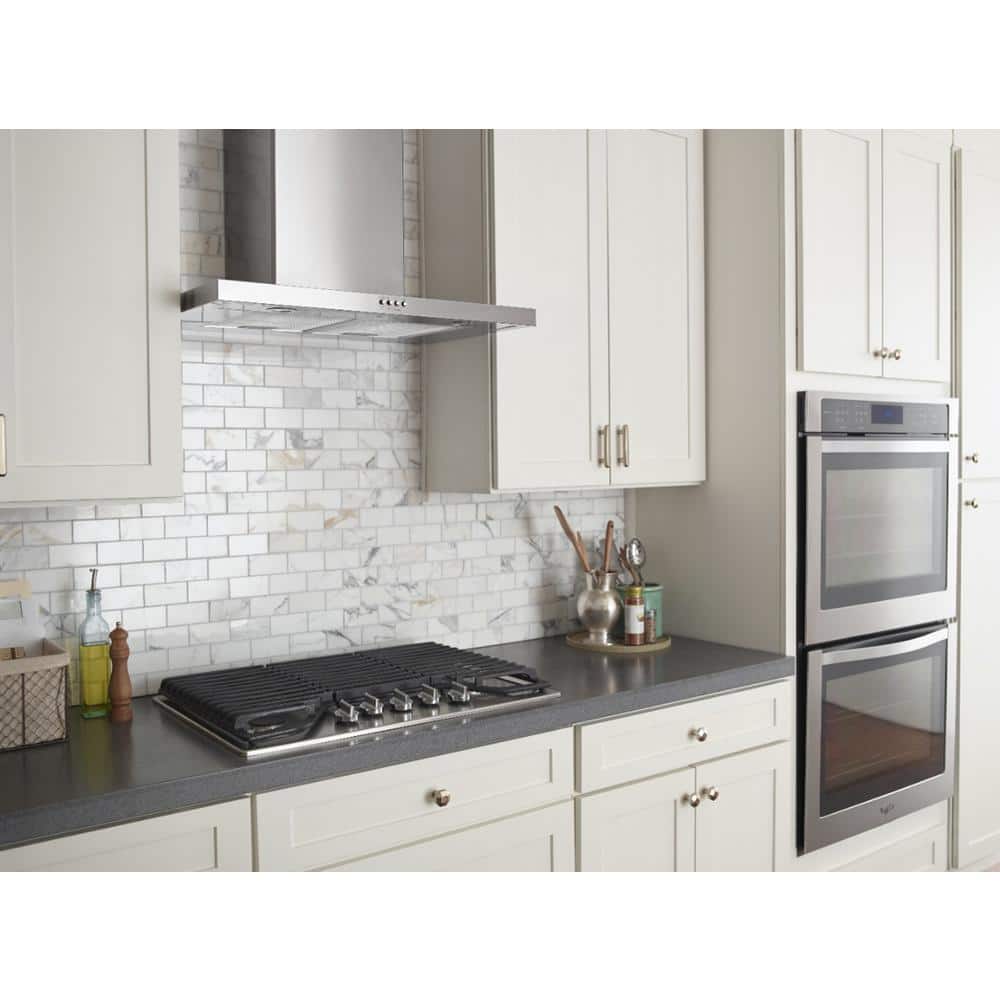 Whirlpool WVW57UC6FS stainless wall range hood installed