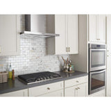 Whirlpool WVW57UC6FS stainless wall range hood installed